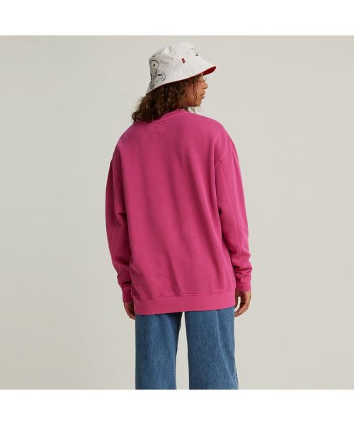 Levi's(リーバイス)/UNBASIC クルーネックスウェットシャツ Snoopy Skater Fuschia Red Garment Dye/img01