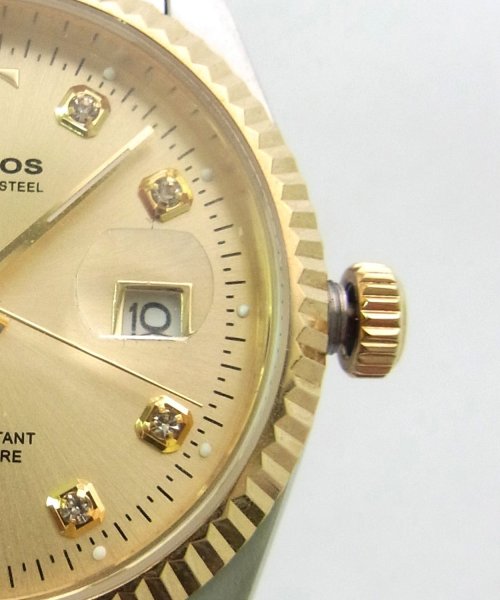 テクノス　ラウンド　デイト 