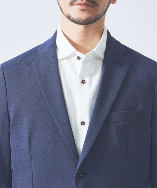 【セットアップ対応/FLEX JACKET】ポンチ シャンブレー ジャケット モデル：H178 B82 W76 H88 着用サイズ：48ネイビー