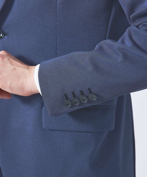 【セットアップ対応/FLEX JACKET】ポンチ シャンブレー ジャケット モデル：H178 B82 W76 H88 着用サイズ：48ネイビー