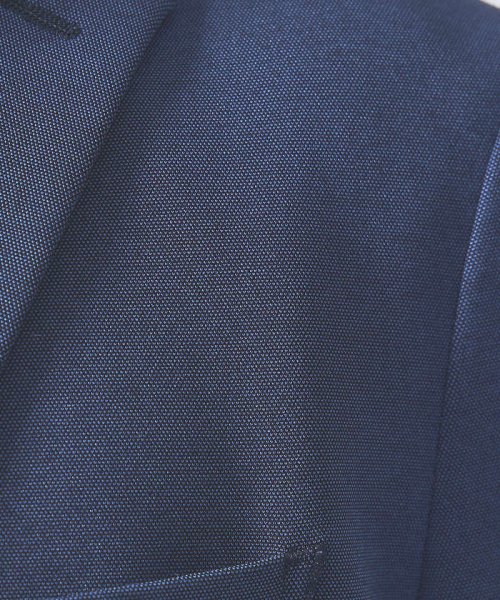 【セットアップ対応/FLEX JACKET】ポンチ シャンブレー ジャケット モデル：H178 B82 W76 H88 着用サイズ：48ネイビー