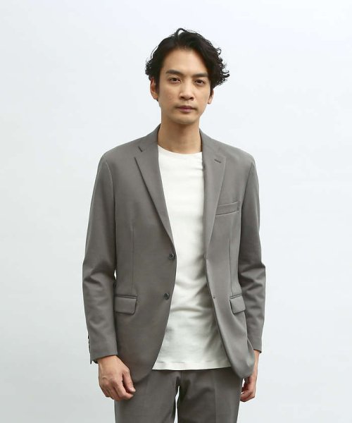 【セットアップ対応/FLEX JACKET】ポンチ シャンブレー ジャケット モデル：H178 B82 W76 H88 着用サイズ：48ネイビー