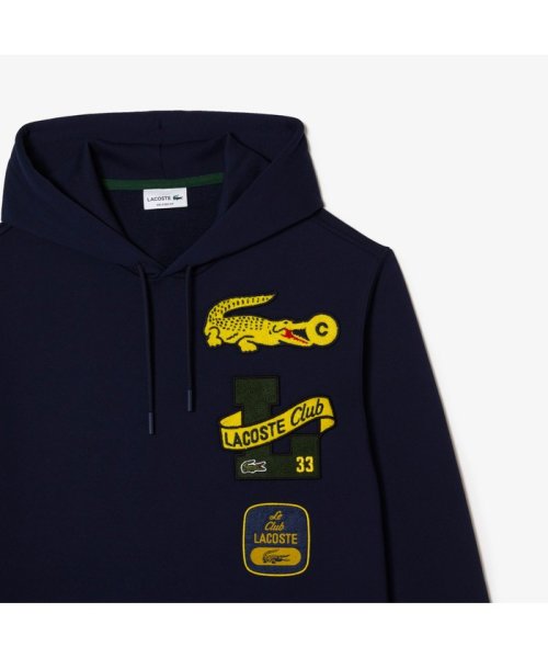 ヘリテージワッペンスウェットフーディー 