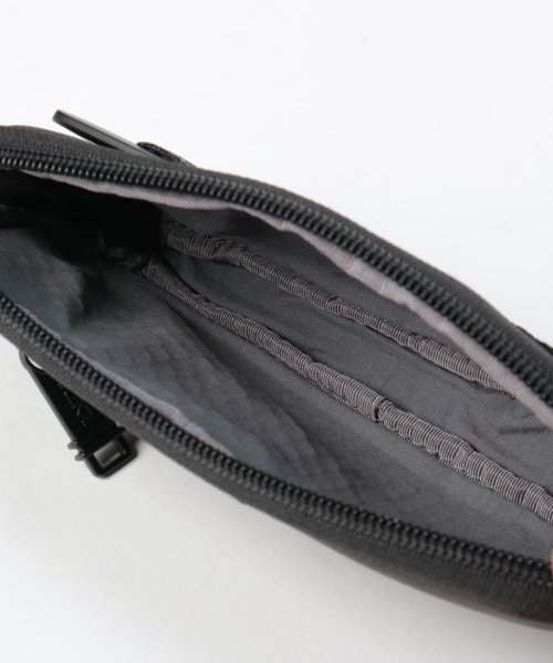 TUMI TRAVEL ACCESS. フォーン・ポーチ TRAVEL ACCESS Alpha