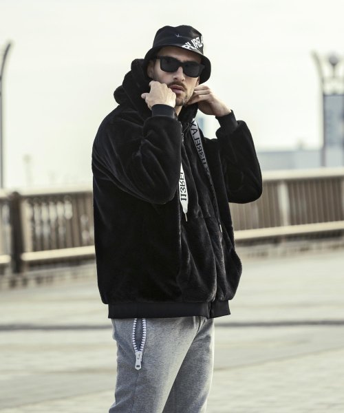 1PIU1UGUALE3 RELAX(ウノピゥウノウグァーレトレ リラックス)スピンドルロゴファーブルゾン 袖丈51