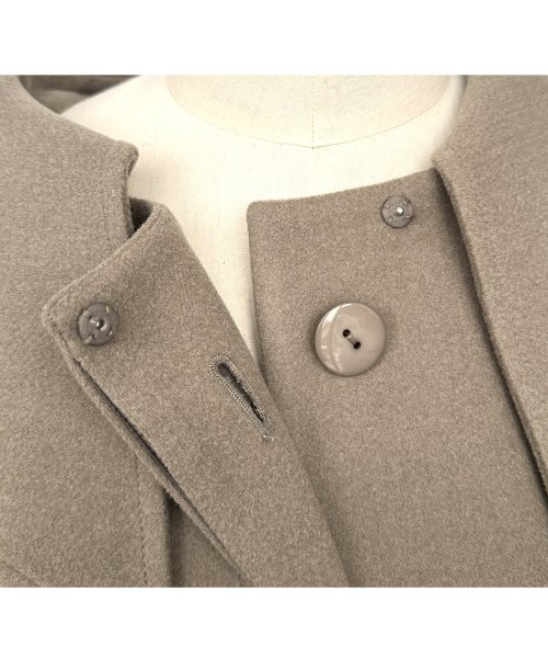 ウーリーストレッチ2wayバックタックロングノーカラーコート(K1267) K1267 ウーリーストレッチ2wayバックタックロングノーカラーコート ふくらみ感があり 保温効果も高めます ブラック