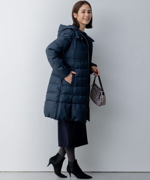 【洗える】ライトタフタロングダウン 通気性の良いダウン用素材に仕上げています 仕上げで表面を微起毛することでウールのような暖かさ ウールでは難しい軽さのある素材です 裏面に特殊なシレー加工を施し