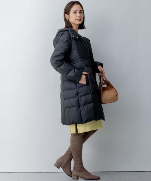 【洗える】ライトタフタロングダウン 通気性の良いダウン用素材に仕上げています 仕上げで表面を微起毛することでウールのような暖かさ ウールでは難しい軽さのある素材です 裏面に特殊なシレー加工を施し