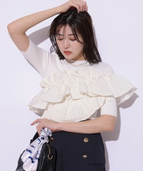 5分袖アシメフリルニット 予めご了承ください