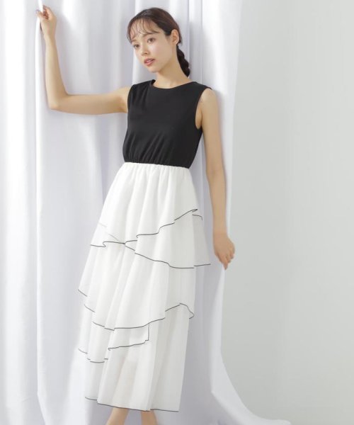 スムースドッキングボリュームアシメワンピース 商品説明一枚でスタイルが決まる！スムースカットソーとシアースカートをドッキングしたレディなワンピースです。配色の効いた E1438215098(11000円)