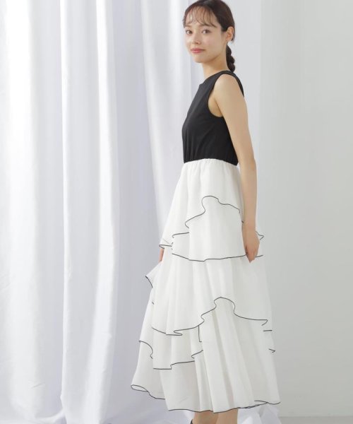 スムースドッキングボリュームアシメワンピース 商品説明一枚でスタイルが決まる！スムースカットソーとシアースカートをドッキングしたレディなワンピースです。配色の効いた E1438215098(11000円)