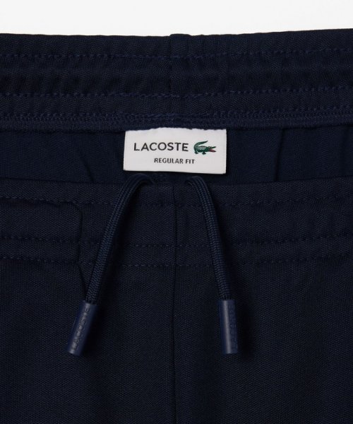 LACOSTE Mens(ラコステ　メンズ)/センタークリース 鹿の子地クラシックトラックパンツ/img01