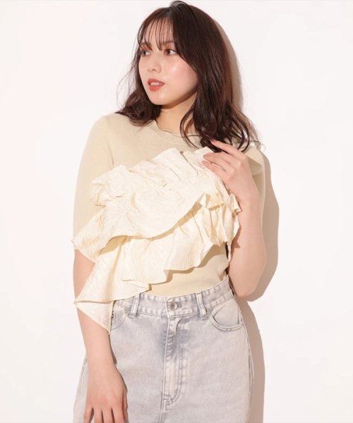 5分袖アシメフリルニット 予めご了承ください