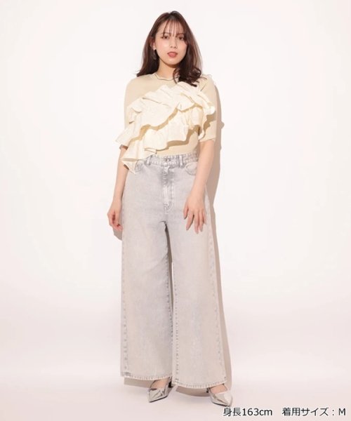 5分袖アシメフリルニット 予めご了承ください