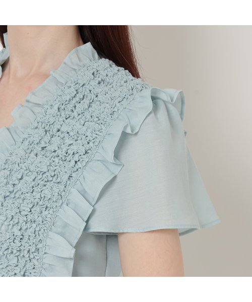 シャーリングブラウス 