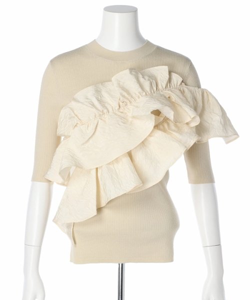 5分袖アシメフリルニット 予めご了承ください