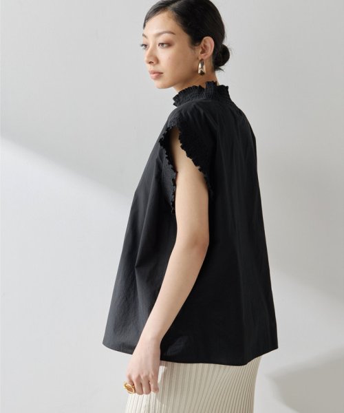 シャーリングブラウス 