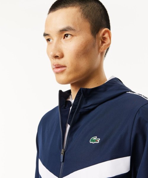 LACOSTESPORTS MENS(ラコステスポーツ　メンズ)/撥水 スリーブテーピング ジップアップトラックフーディー / トラックジャケット/img01