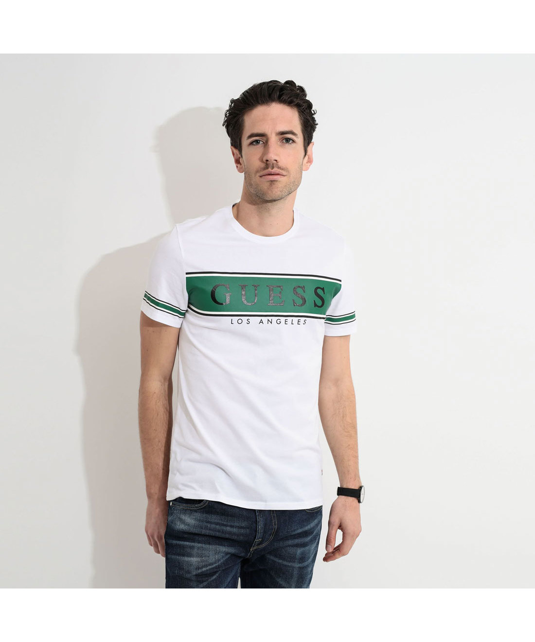 green and white striped guess shirt