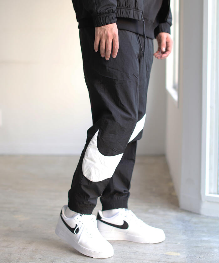 nike swoosh trousers