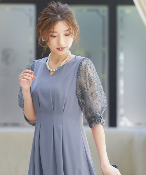 セール ニアナ Niana 結婚式 ワンピース パーティードレス レース袖 Aライン フレアシルエット 体型カバー スキッパー ボリューム袖 花柄 ロング 透け感 ウエストゴム 5分袖 Magaseek セール ニアナ Niana 結婚式 ワンピース パーティードレス レース袖 Aライン フレアシルエット 体型カバー スキッパー ボリューム袖 花柄 ロング 透け感 ウエストゴム 5分袖 Magaseek