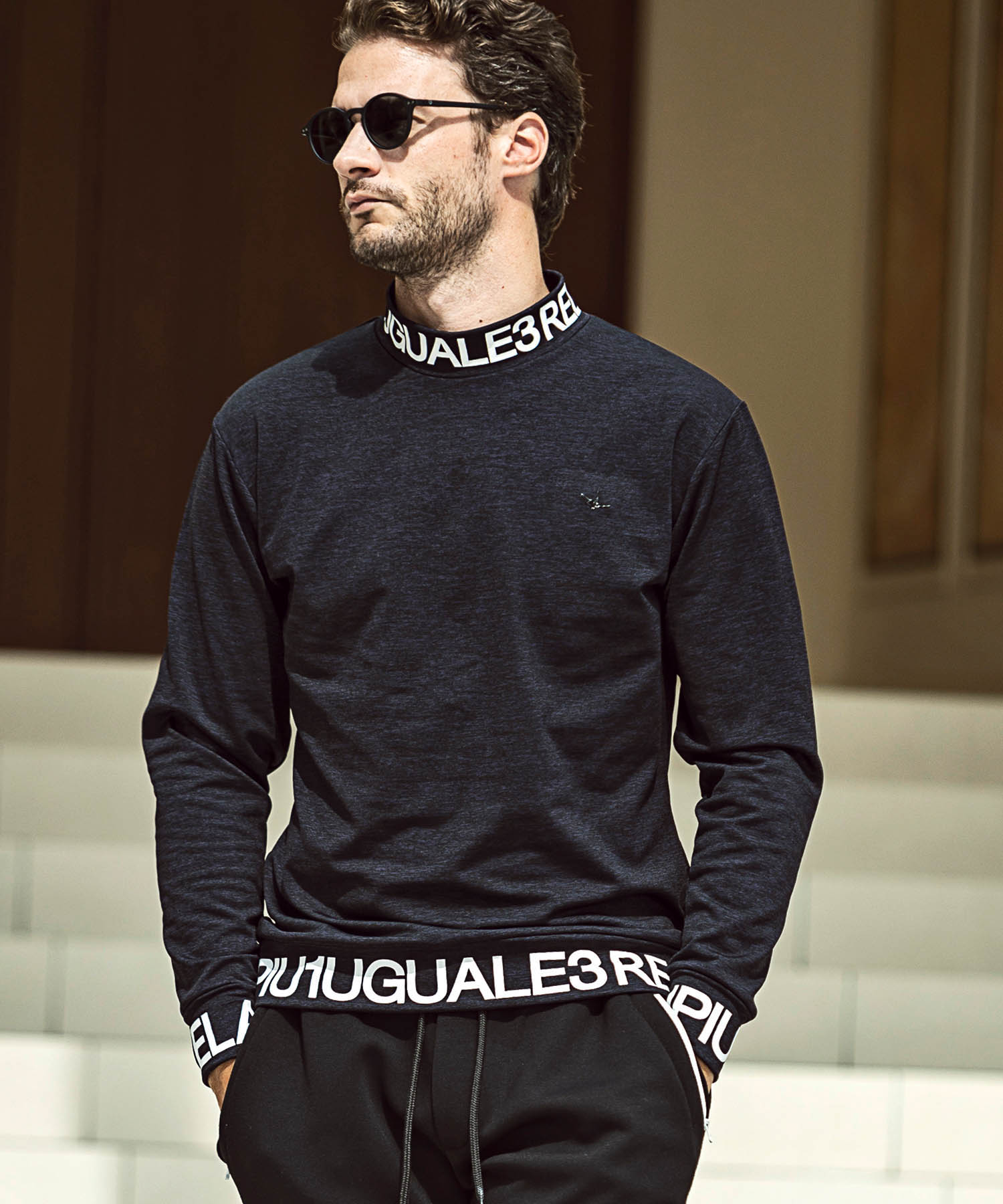 ウノピゥウノウグァーレトレゴルフ ハイネックインナーシャツ 黒×白