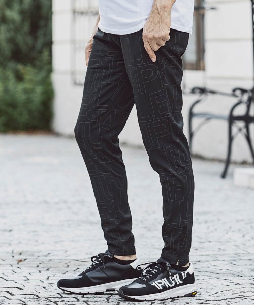 総柄ロゴストレッチサルエルパンツ メンズファッション 阪急百貨店公式通販 阪急 Men S Online Store