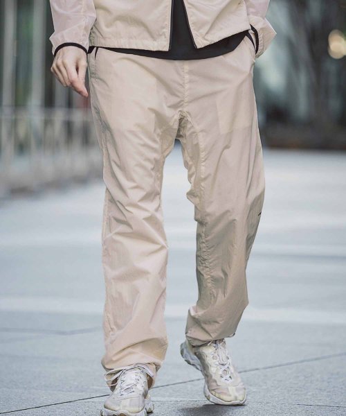 +phenix(＋phenix)/+phenix プラスフェニックス COMPACT WIND PANTS コンパクト ウィンドパンツ 撥水 軽量 【MENS】/ベージュ