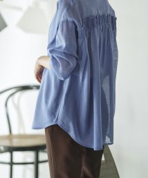 GeeRA(ジーラ)/バックフリルボリューム袖シアーシャツ/ブルー