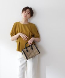 N Natural Beauty Basic(エヌナチュラルビューティベーシック)/サイドボタンペプラムブラウス/イエロー