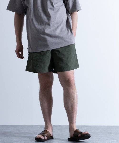 セール】撥水 ナイロン ショートパンツ(503147092) ナイラス(Nylaus) MAGASEEK NIKEナイキ ブルーリボン付き ナイロン 膝下パンツ M