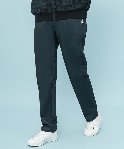 le coq sportif (ルコックスポルティフ)/ヘランカ防風ツイルジャージ AIR STYLISH PANTS  L‘oeuf forme/グリーン