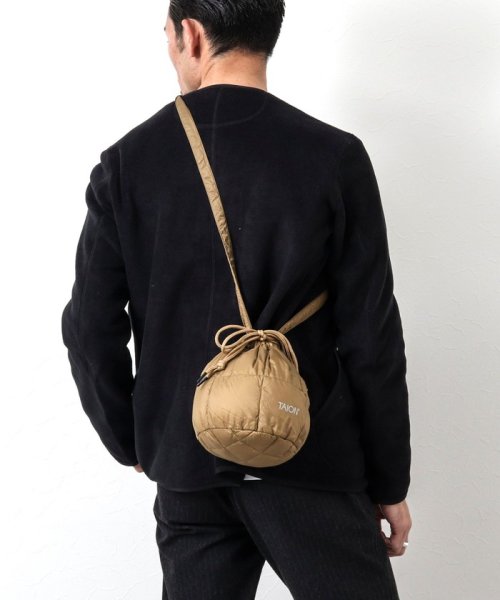 NOLLEY’S goodman(ノーリーズグッドマン)/【TAION/タイオン】DRAW STRING DOWN BAG S /ベージュ