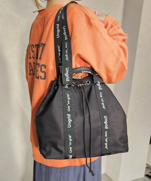 UNGRID bag(アングリッド　バッグ)/ナイロン ロゴテープ　牛革ハンドル　2WAY 巾着トートバッグ/BLK