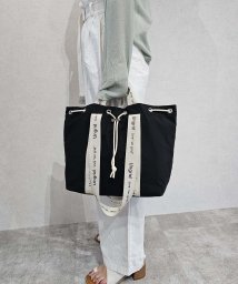 UNGRID bag(アングリッド　バッグ)/ナイロン ロゴテープ　牛革ハンドル　2WAY 巾着トートバッグ/BLK/IVO