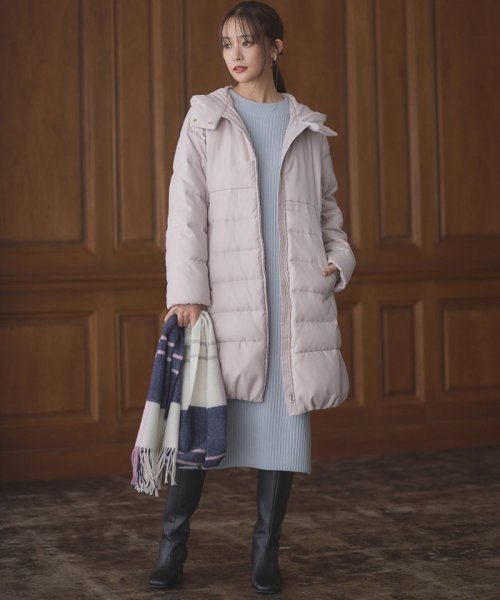 【洗える】ライトタフタロングダウン 通気性の良いダウン用素材に仕上げています 仕上げで表面を微起毛することでウールのような暖かさ ウールでは難しい軽さのある素材です 裏面に特殊なシレー加工を施し