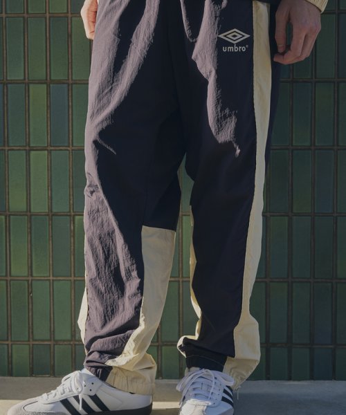 ADAM ET ROPE'(アダム　エ　ロペ)/《別注》【UMBRO/アンブロ】TRACK PANTS/ネイビー（40）