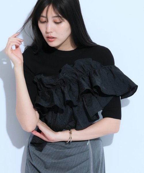 5分袖アシメフリルニット 予めご了承ください