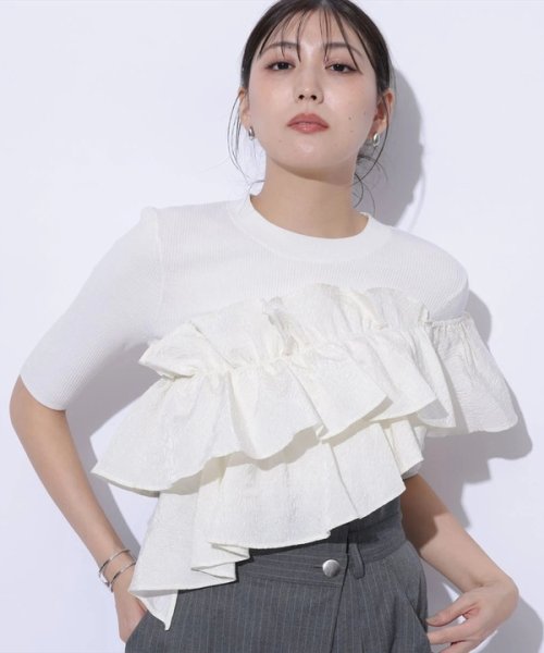5分袖アシメフリルニット 予めご了承ください