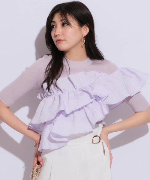 5分袖アシメフリルニット 予めご了承ください