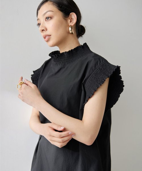 シャーリングブラウス 