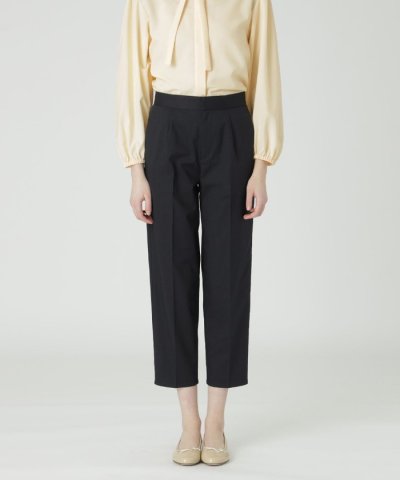 サイロクリアスパンツイルスリムパンツ