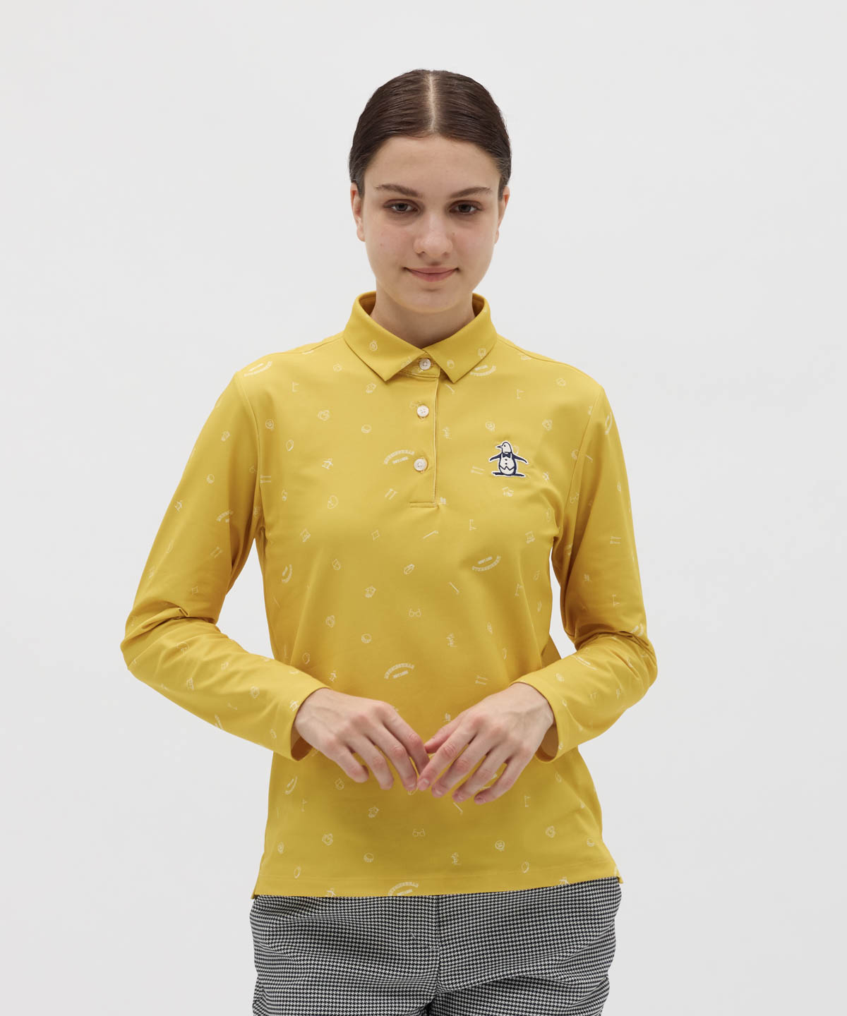 マンシングウェア Munsingwear 裏微起毛 飛びアイコン柄プリント